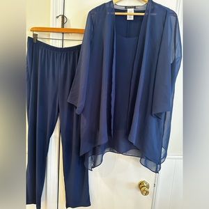 Navy blue three piece pant suit 95% polyester 5% spandex beautiful never worn.